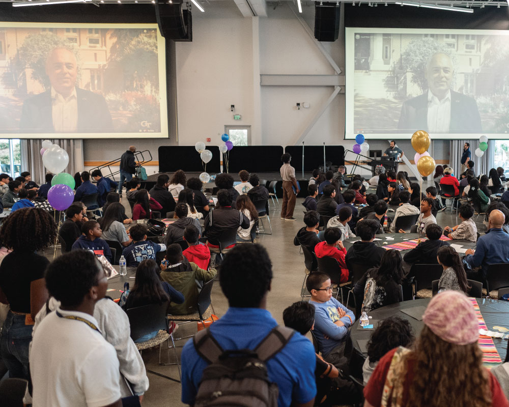 auditorium of students watching a presentation